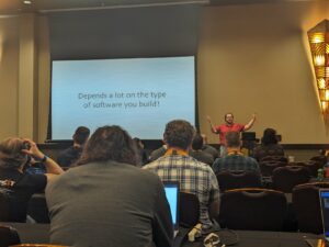 Nate Schutta presenting "Thinking Architecturally" at CodeMash 2024 - with a slide that says "Depends a lot on the type of software you build!"